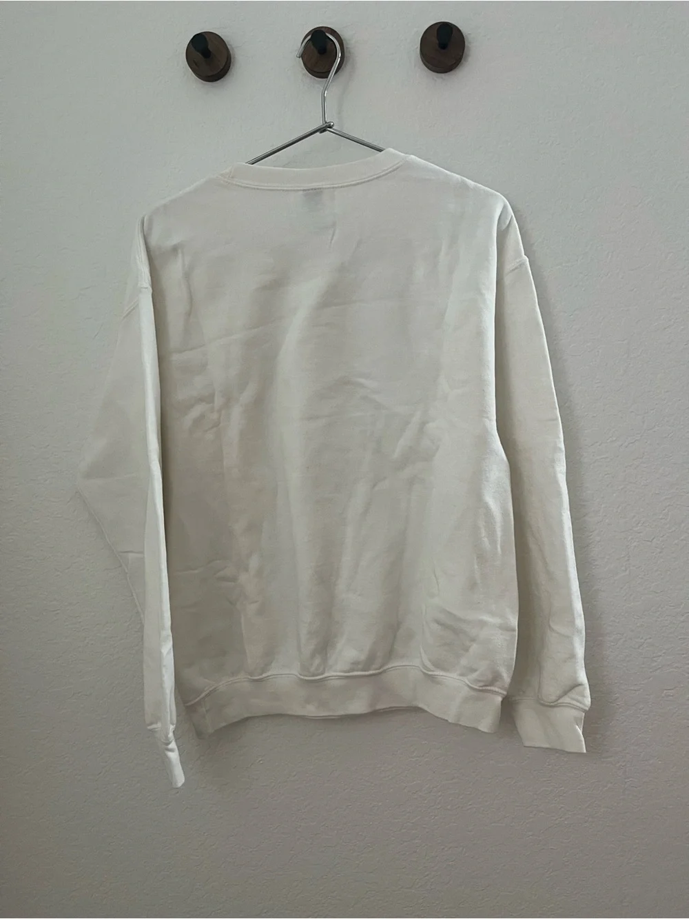 Amazon Cream Sweatshirt with Orange Castle & Bow Graphic